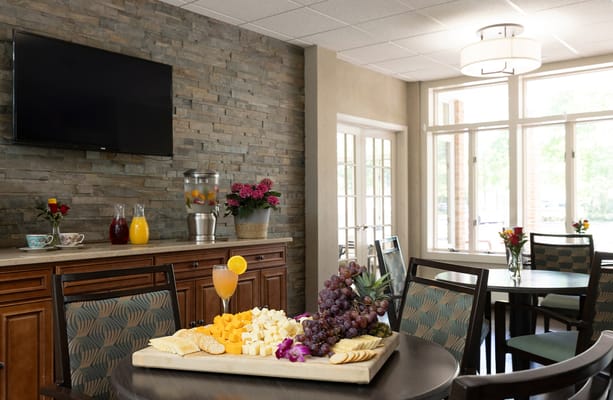 Dining area with a cheese and fruit platter