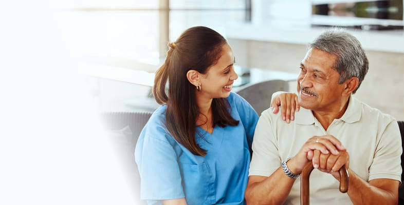 Staff member interacting with a resident in a common area