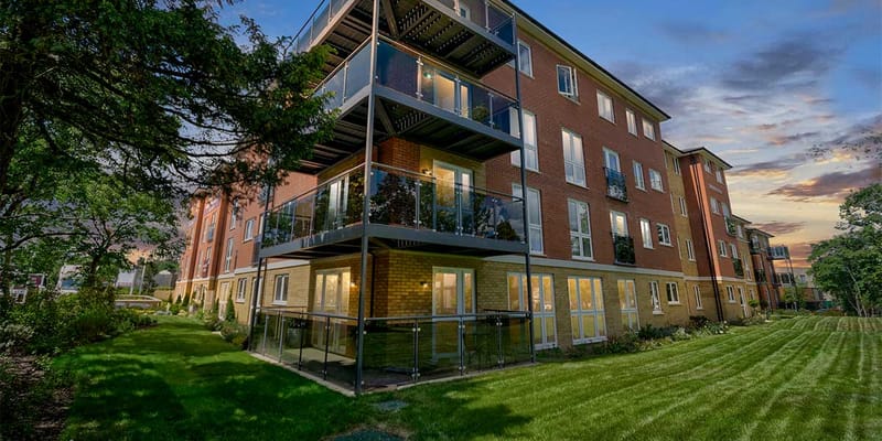 Building exterior of Spitfire Lodge at dusk