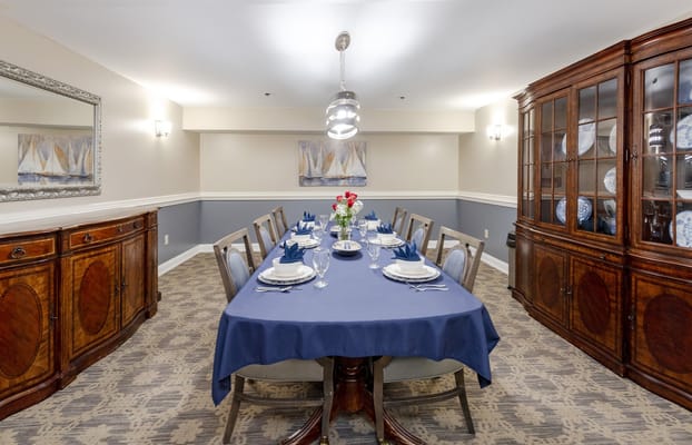 Elegant dining room setup with a large table and decor