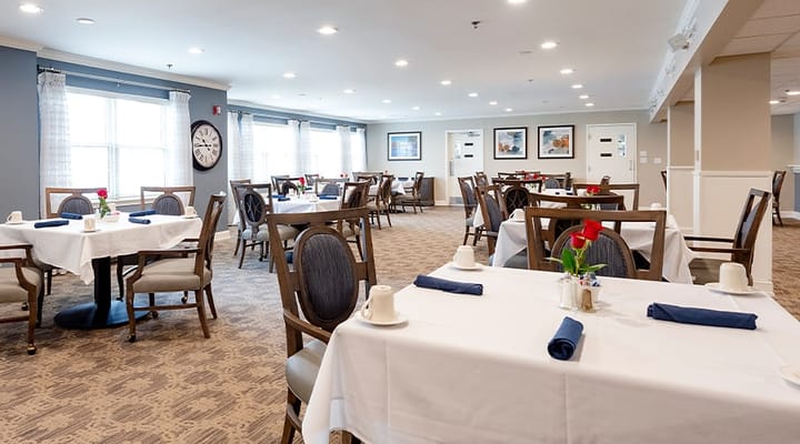 Dining area with well-set tables and decor