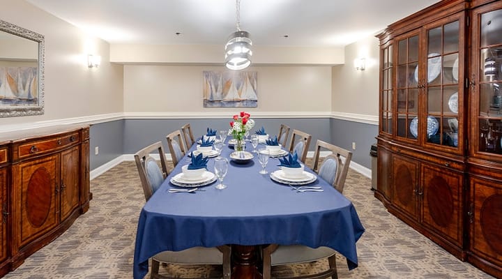 Formal dining room set up for a meal.