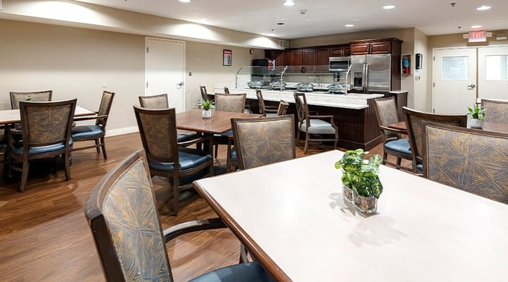 Dining area with wooden tables and chairs