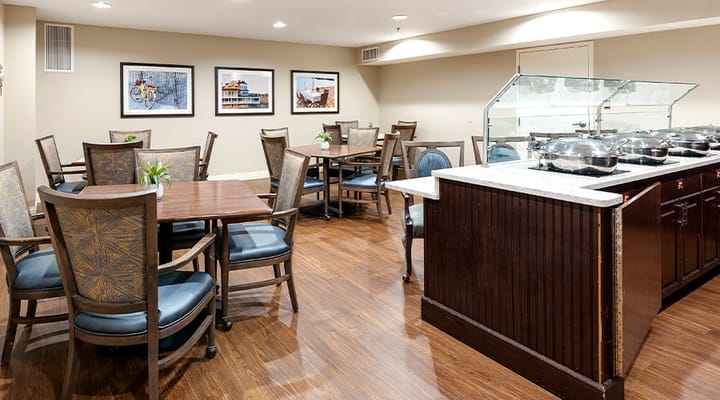 Dining room area with tables and food setup