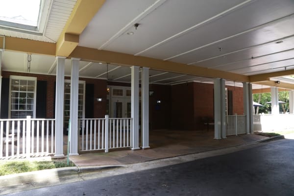 Welcoming entrance with covered porch at The Retreat at Cascade