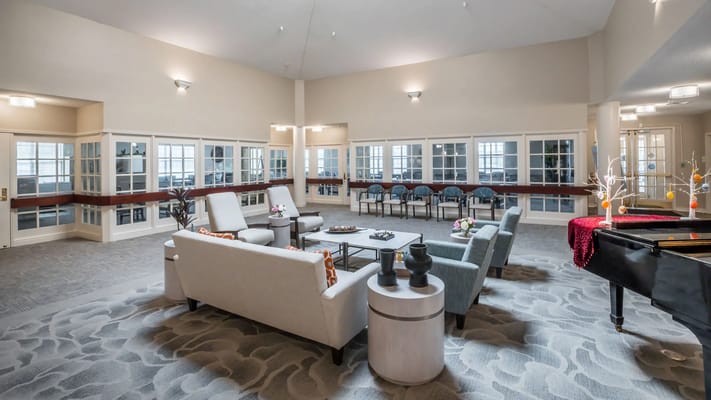 Common area with seating and large windows