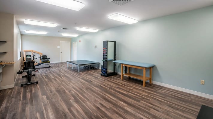 Interior view of a fitness area with equipment