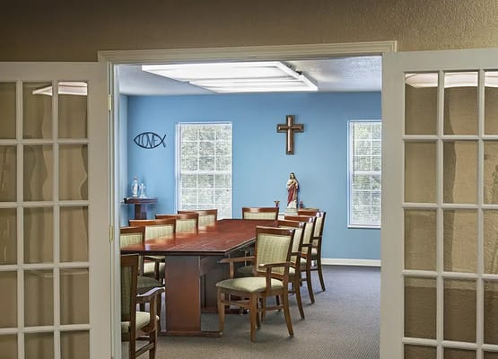 Interior view of a meeting room with a long table