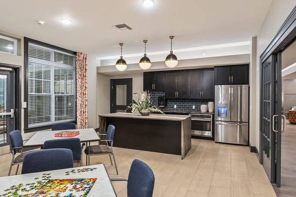Bright and modern interior of a common area with tables