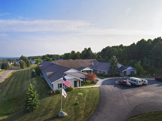 Aerial view of American House Petoskey with surrounding greenery