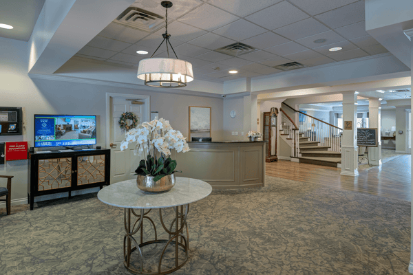 Elegant lobby area with a floral centerpiece