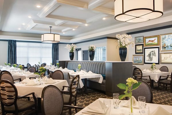 Elegant dining room setup with tables and decor