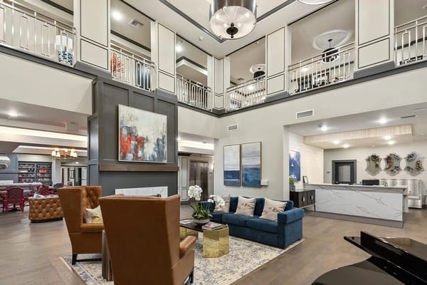 Common area lounge with seating and artwork