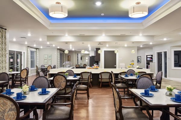 Dining area with tables set for meals