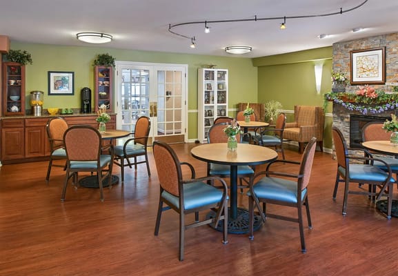 Bright common area with tables and chairs