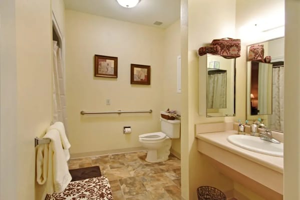 Well-lit bathroom in a senior living facility