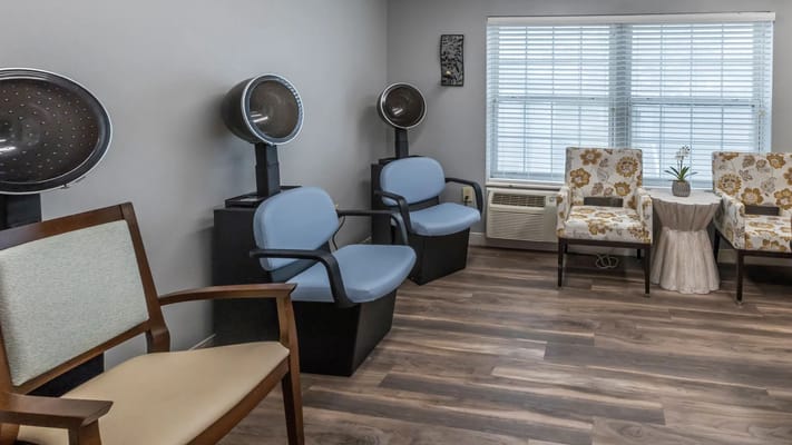 Interior view of a salon area with seating