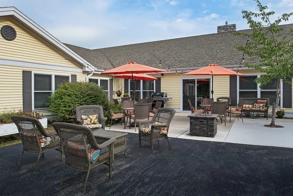 Outdoor seating area with umbrellas and chairs