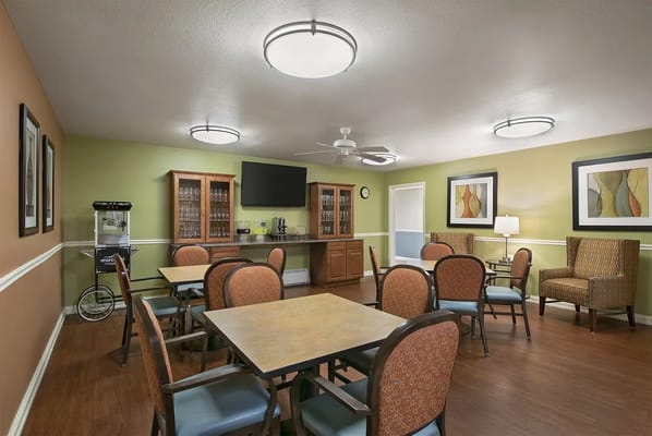 Dining area with tables and chairs in a common space