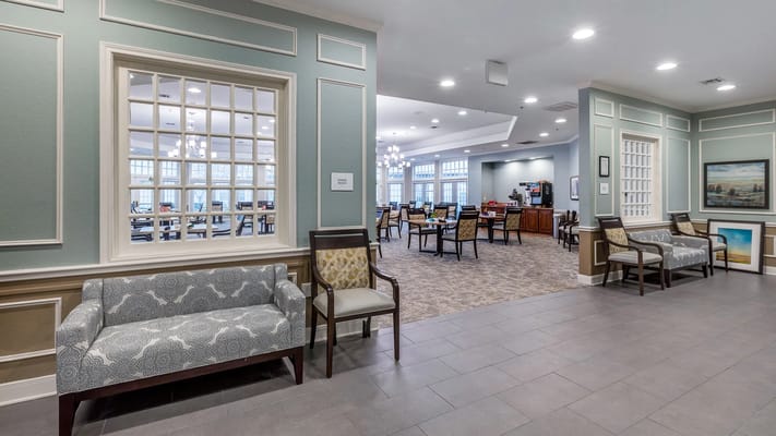Interior view of a common area with seating and dining
