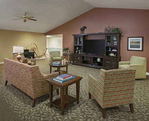 Bright common area with seating and decor