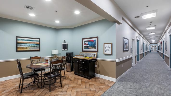 Interior view of a hallway with seating area