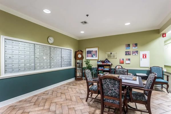 Common area with mailboxes and seating