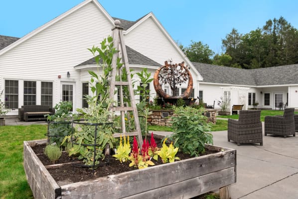 Garden area with seating and artwork