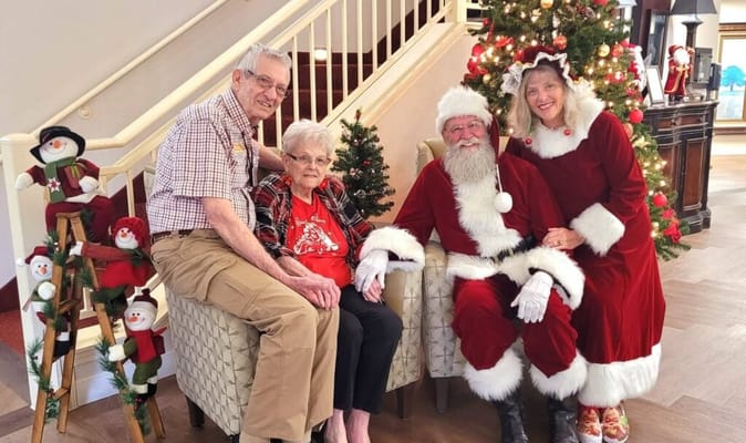 Residents celebrating with Santa Claus during the holidays