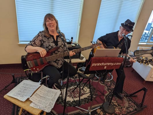 Musicians performing in an indoor setting