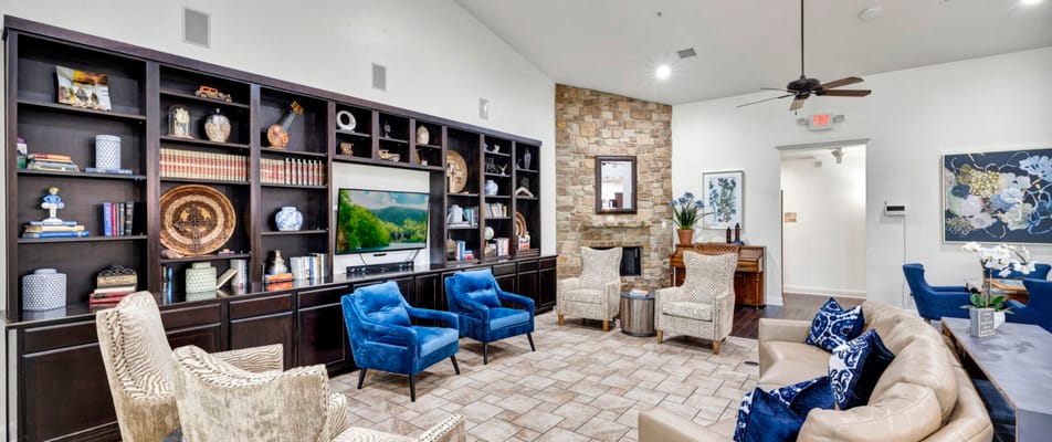 A well-furnished common area with seating and decor