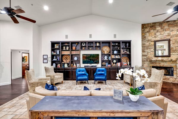 Bright common area with comfortable seating and decor