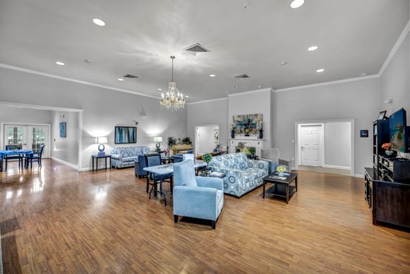 Bright common area with seating and art