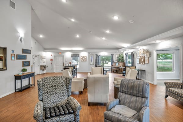 Interior common area with seating and natural light