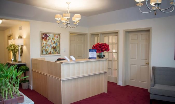 Interior view of a reception area with flowers