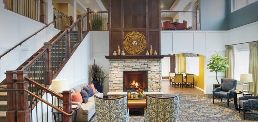 Bright and inviting living room area with a fireplace