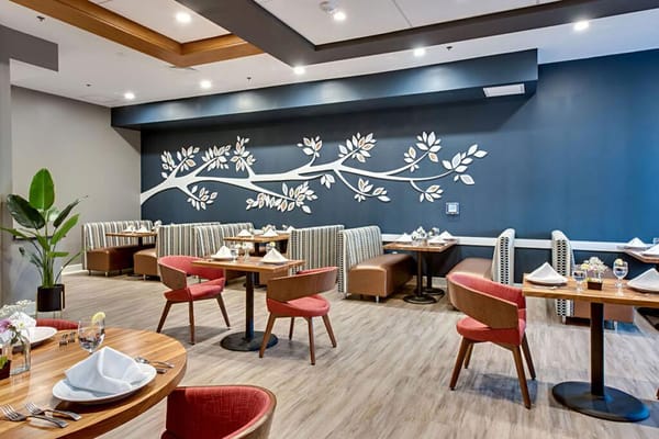 Bright dining area with modern decor and seating