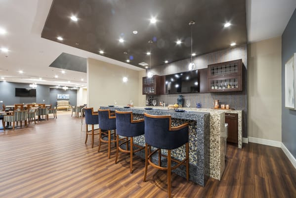 Common area featuring a bar with seating