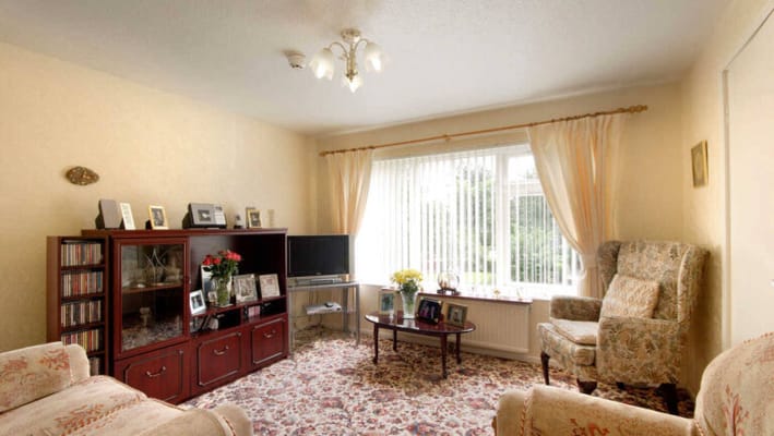 A cozy shared living room with comfortable furniture