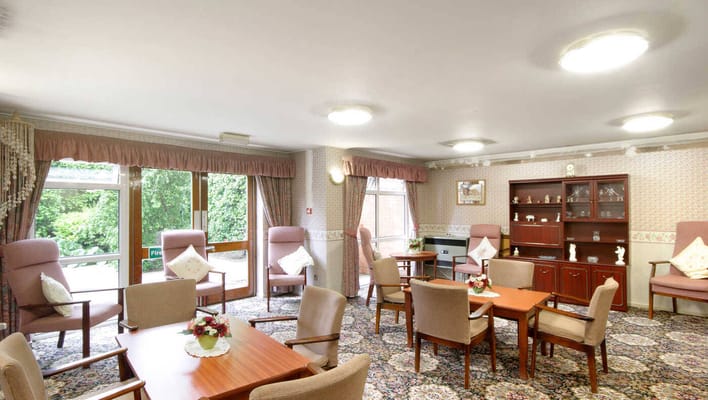 Bright common area with seating and natural light