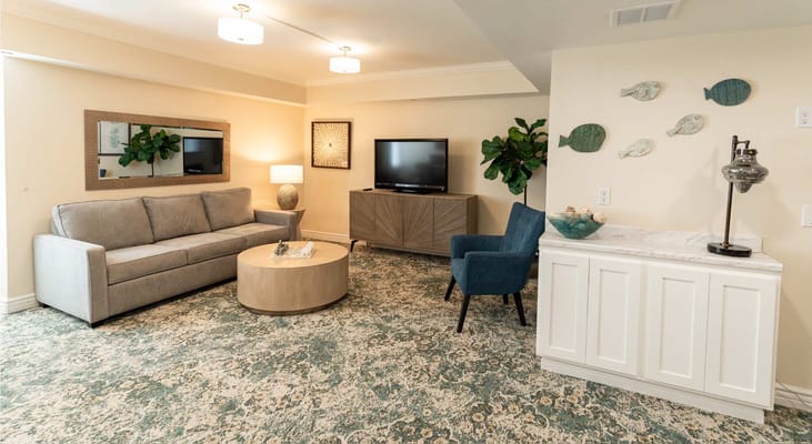 A cozy common area with seating and decor