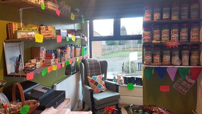 Interior of a small shop area with products and decor