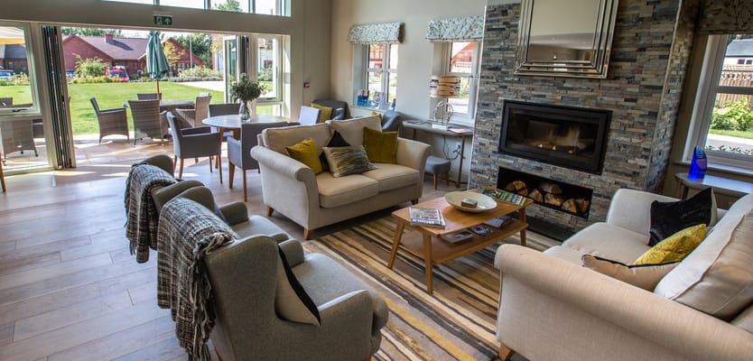 Bright lounge area with access to outdoor space