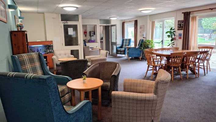 Comfortable lounge area with seating and tables