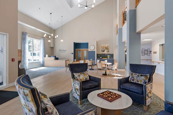 Bright interior of the facility lobby with seating area