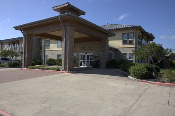 Exterior view of a senior living facility entrance