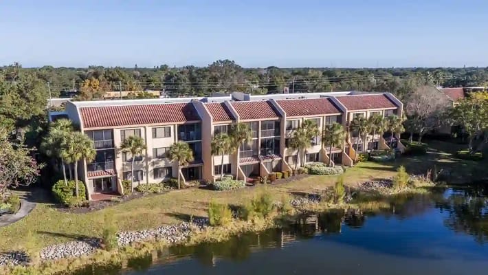Aerial view of the residential building by a lake