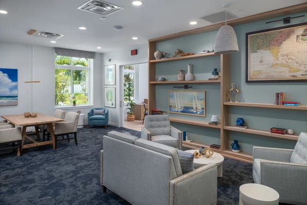 Bright common area with seating and decor