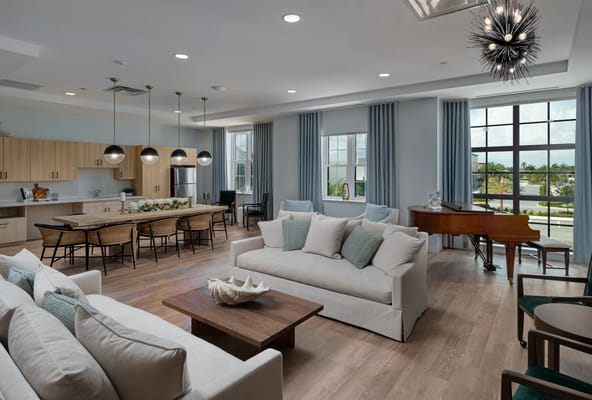 Bright common area with seating and natural light
