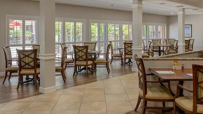 Interior dining area with tables and chairs